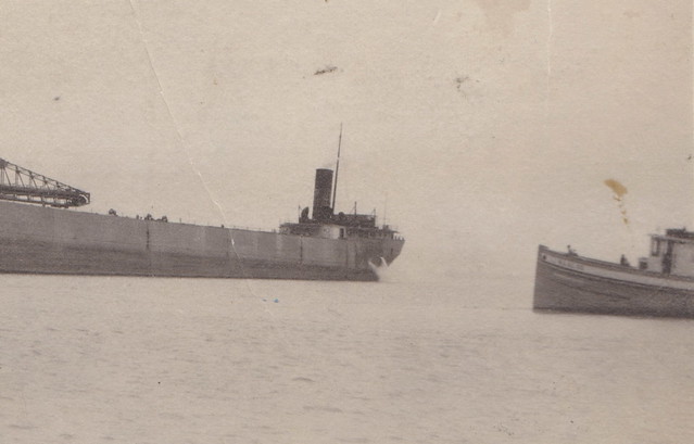 SHIP SS CARL D. BRADLEY & TUG RPPC 1920 FREIGHTER THE BRADLEY had SHIPWRECK DISASTER 1958 Lake Michigan 35 crew members, 33 died in the sinking and 23 were from the port town of Rogers City3