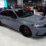 Honda Civic Type R (2024) Production: 1972 -
Generation: Eleventh (2021 - )
Engine: 2,0 litre VTEC turbo R4 (petrol)
Power: 320 PS
Gearbox: 6 speed manual
Layout: front engine, front drive

This Sonic Gray Type R has a list price of $46.345.