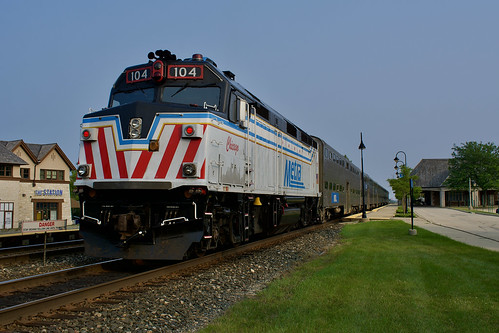 7-24-23, Metra F40PH-3 104 Shoving Metra train 2150 toward Chicago at 6:09 PM at the Lake Forest, IL station.