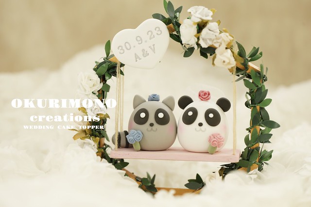 Love panda and raccoon bride and groom with wooden hexagon flowers swing OKURIMONOcreations Wedding Cake Topper, pets wedding cake decoration ideas