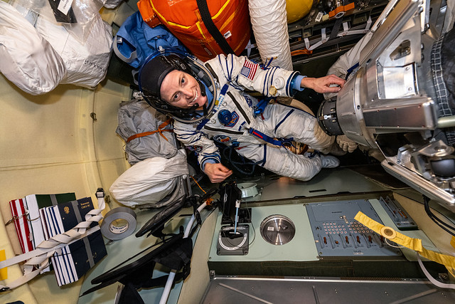 Astronaut Loral O'Hara tries on the Sokol launch and entry suit