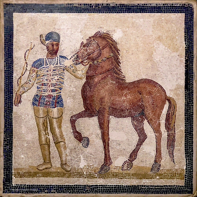Mosaic: detail of the Blue faction charioteer and horse