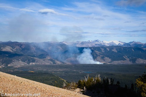A controlled burn in the valley with the White Cloud Mountains beyond (Blackmon Peak is out there somewhere!) from the slopes of Thompson Peak, Sawtooth National Recreation Area, Idaho