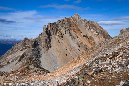 Looking back down at the saddle and to the top of Williams Peak from the slopes of Thompson Peak, Sawtooth National Recreation Area, Idaho