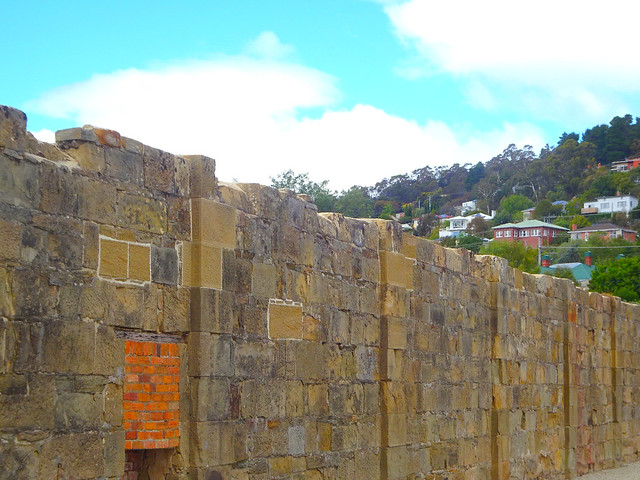 Hobart. In 1827 a  Female Convict Factory established here. When convict transportation ceased in 1853 it became a female prison. Walls of the convict yards.  Site dismantled 1904 and sold. World Heritage listed