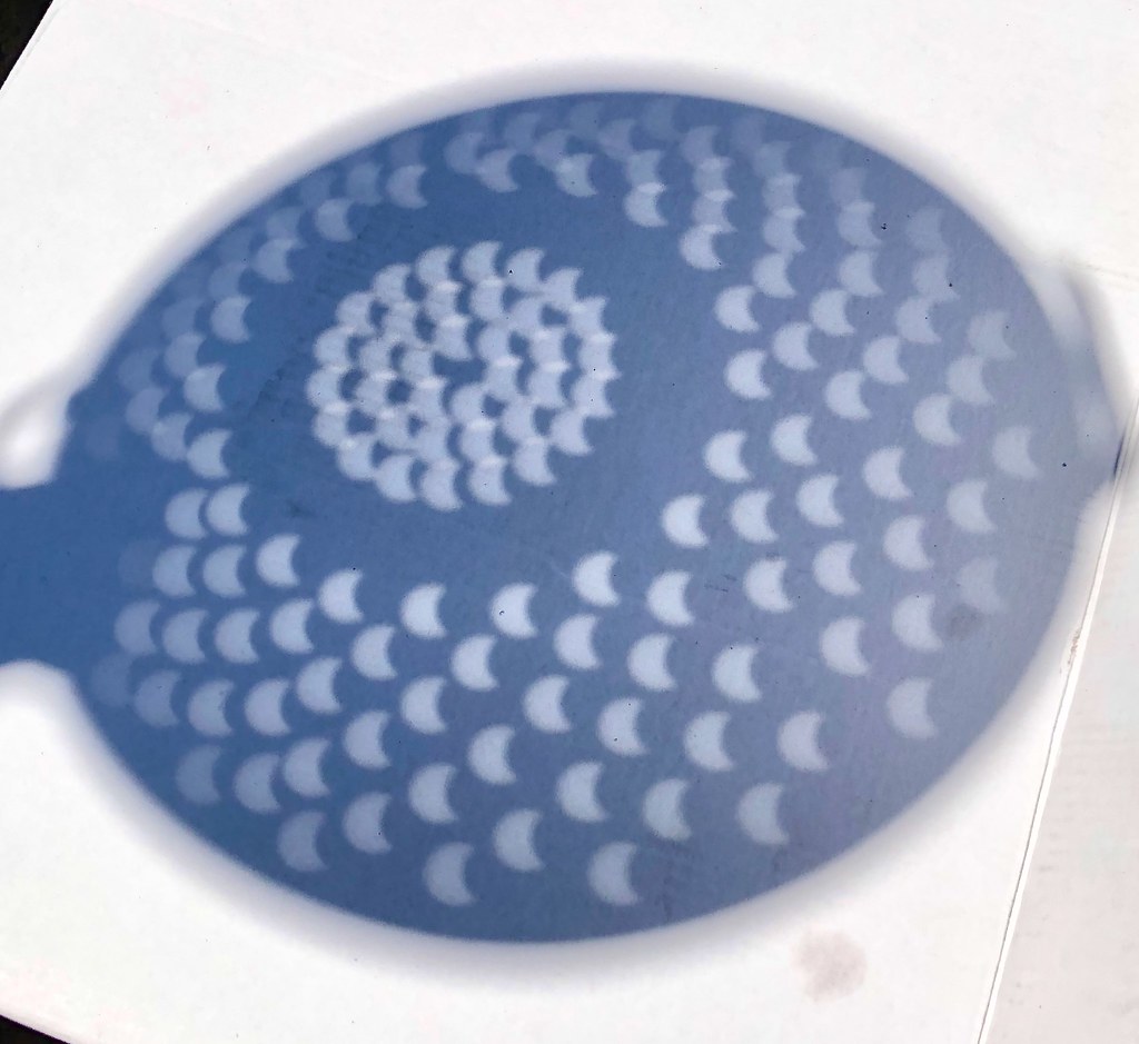 Partial eclipse visualized with colander scientific apparatus IMG_0656