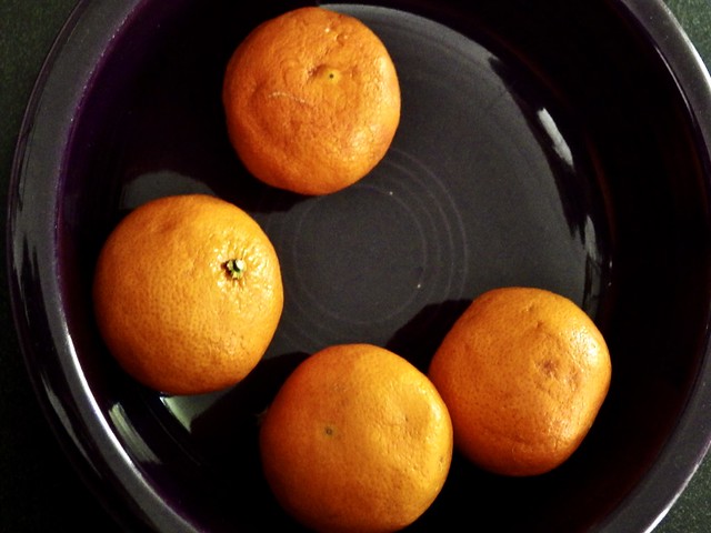 Four Oranges in a Purple Platter