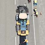Putting down asphalt Crews doing grinding and patching on I-5 in Douglas County.