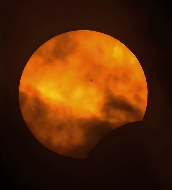Solar Eclipse and Clouds
