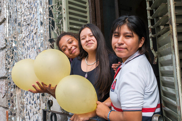 Three girls, three baloons