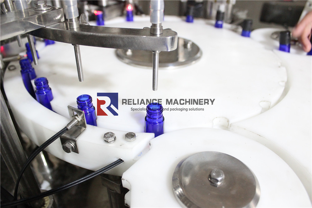Ceramic-pump-roll-on-bottle-filling-capping-machine-RELIANCE02