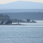 Point No Point Lighthouse (Point No Point, Washington) - Pictures from the Ovation of the Seas - September 2nd, 2022 Pictures of the beautiful Point No Point Lighthouse taken on our way northward after leaving Seattle.  This is one of the early lights you see once you start heading towards Alaska and points north.   Like others along the way, it is not that high off the water.  Taken during our cruise on board the Royal Caribbean Ovation of the Seas for the seven night Alaska Experience Cruise (September 2nd through 9th, 2022).  The cruise embarks from Seattle, Washington and the itinerary includes stops in Juneau (AK), Skagway (AK), Sitka (AK) and Victoria (British Columbia, Canada) before heading back to Seattle. 