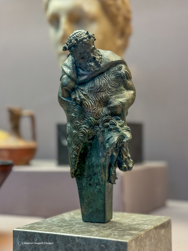 Bronze pillar herm of Herakles wrapped in a lion skin and wearing an ivy wreath