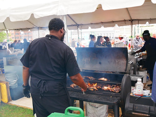 Hard at work on the grill on the first day of French Quarter Fest - April 11, 2024. Photo by Louis Crispino.