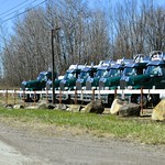 Delivery trucks forming an orderly queue on Route 62, Kennedy, New York (USA) 