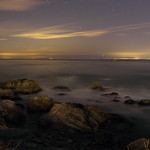 Monterey Bay Nightscape A night photograph of the Northern sky as viewed over Monterey Bay.  The photograph was taken from several vantage points along the Monterey Recreation Trail.  The Monterey Recreation Trail runs from Monterey to Pacific Grove, CA.