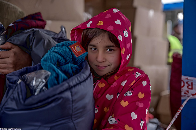 12 year old Sarah, from Qamishli in Syria, receives some winter clothing (Unicef - Anmar)