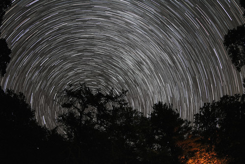 The Return to the Dark Sky This circumpolar star trail image was made of seventy 30 second exposures taken with a Canon T6s and a Canon 8-15 mm f/4L lens. (ISO 3200, 12 mm f/4.0).   I took the image in the dark skies of Fowlers Hollow State Park in Central Pennsylvania.  The glow from my camp fire can be seen to the right of the photo.  It was great to see the Milky Way in its full glory again!