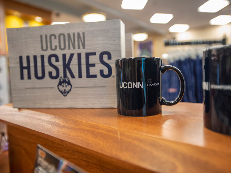 Procurement header photo: UConn Stamford coffee mug for sale in the bookstore at the Stamford campus. Feb. 2, 2023. (Sean Flynn/UConn Photo)