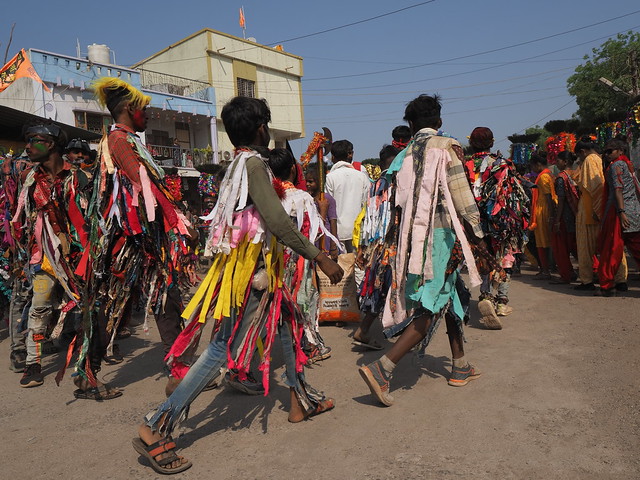 Rathwa boys dressed in colourful rags in a bid to attract a girl's attention