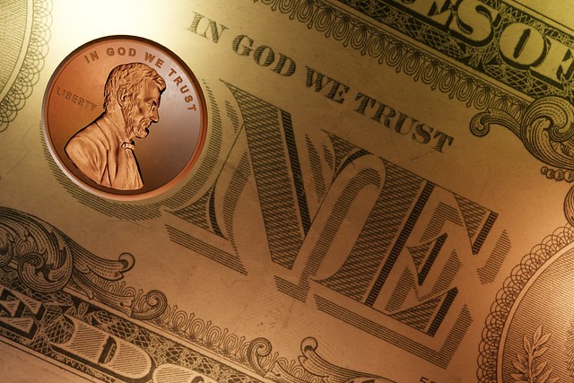 One Penny On One Dollar Bill