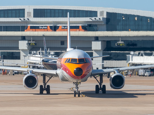 Grinningbird Pacific Southwest Airlines livery on American N582UW departing DFW for Salt Lake City with flight AA344