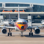 Grinningbird Pacific Southwest Airlines livery on American N582UW departing DFW for Salt Lake City with flight AA344