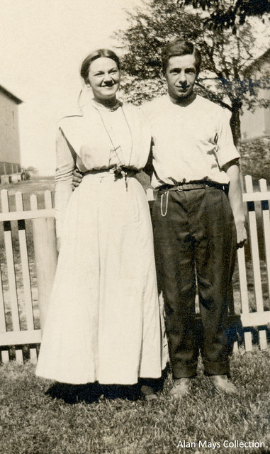 Mennonite Couple Arm in Arm on a Farm (Cropped)