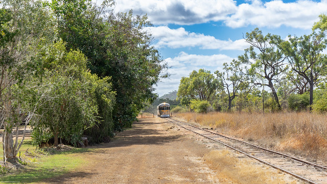 Here comes the train. The track runs along the side of the Caravan Park at Mount Surprise, Qld.