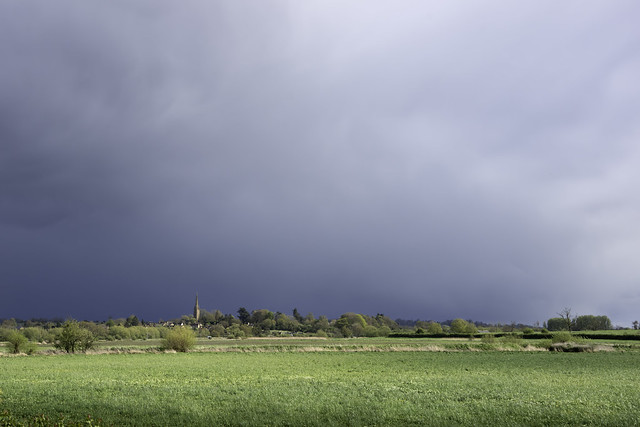 Storm clouds over King's Sutton and the Cherwell water-meadows, Northamptonshire