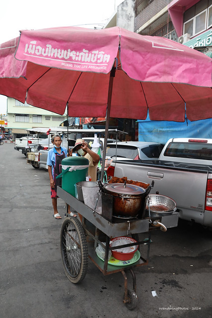 Umbrella covering a street food cart - Samut Songkhram Thailand