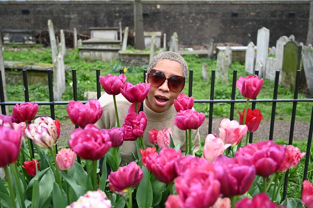 DSC_4657 Alesha Jamaican Model with Short Blond Hair and Sunglasses in Beige Wool Dress on Location at Bunhill Fields Dissidents Cemetery City of London