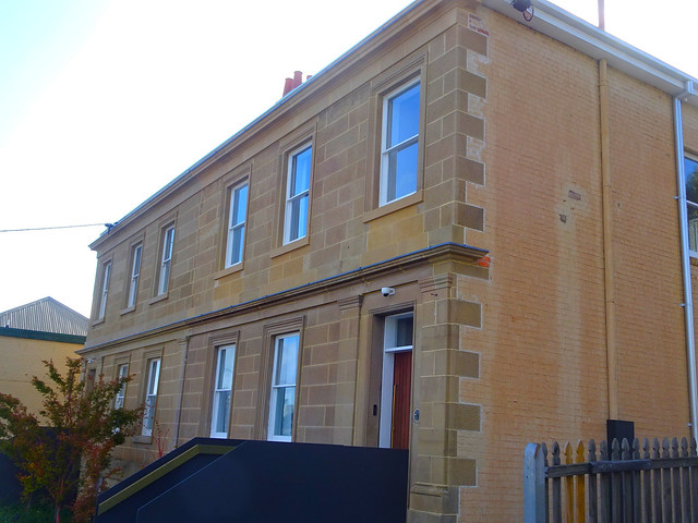 Hobart. Macquarie Street. Fine sandstone joined town houses built in the 1840s or 1850s.