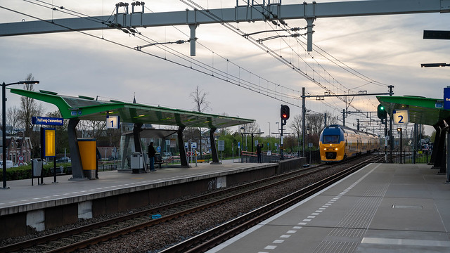 InterCity rushing through Halfweg-Zwanenburg station