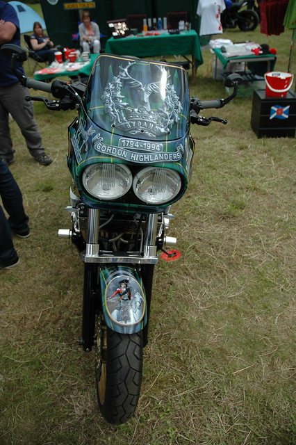 An Ex  Gordon Highlander  Motor Bike all done up in Regimental colours.