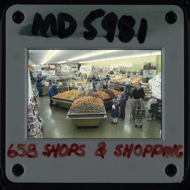Shoppers in a Kilbirnie supermarket, Wellington Photographer: W. Cleal October 1983