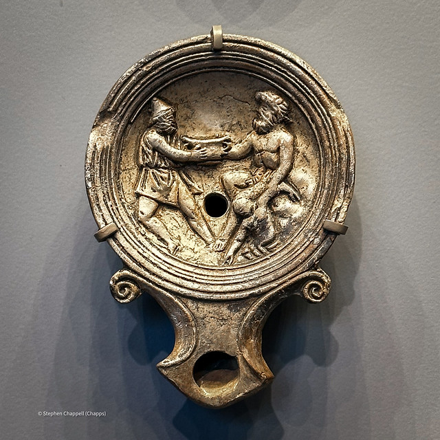 Terracotta lamp with the figures of Odysseus and Polyphemus (the cyclops)