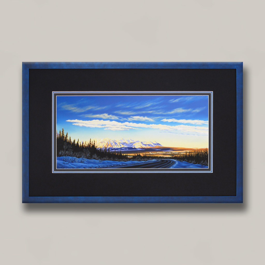 The bright blue frame really brings out the clarity of the dark areas in this stunning art print of Haine's Junction, Yukon. #CustomFraming #CustomFrames #RedDeer