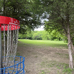 CHains 17 April 2024
108 of 366

I enjoy disc golf for many reasons, but among the top of the list are scenes like this one. Unfortunately the thick grass was not cooperating with my game, stopping discs in their tracks. 
Basket 15 at Towne Lake Disc Golf Course. 