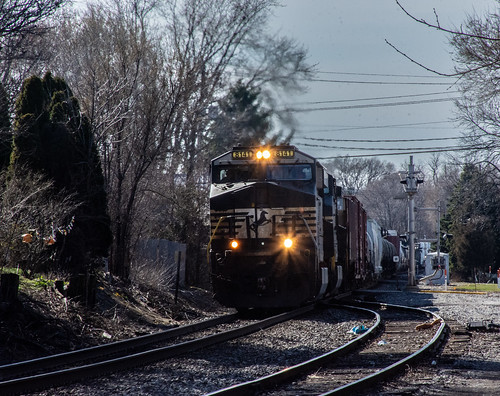 Clyde An NS pair head east through Clyde (at the siding for the Sunshine Coop, on the NS Toledo District,8141 (ES44AC) leads 9662 (Dash9-44CW)