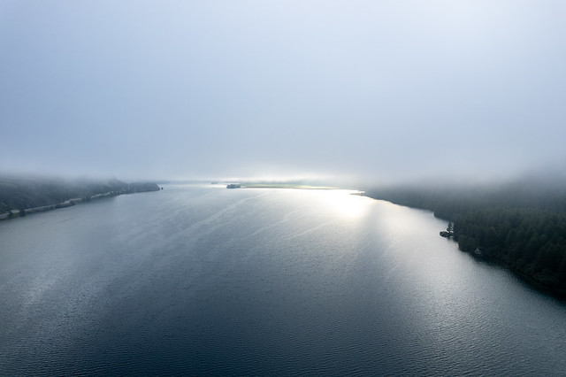 Lake Sils with morning fog by drone