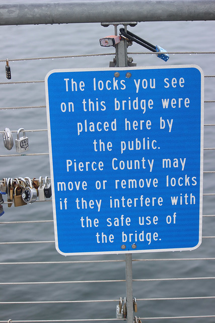sign  on bridge to the beach