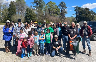 Master Naturalists lead a team of civilian scientists into the field to collect biodiversity data in the Spring at Chippokes - the team poses for a group photo.