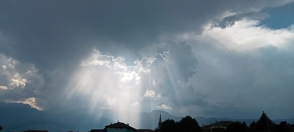Rays of sun through the clouds after the storm.