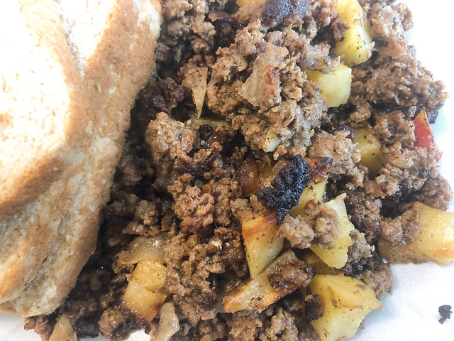 ground beef with potatoes and white bread for dinner