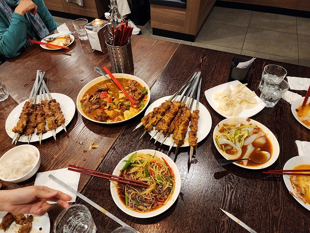 Dapanji spicy chicken with noodles, lamb skewers, bean jelly, shredded potato salad - Kaynam Uyghur, Carnegie