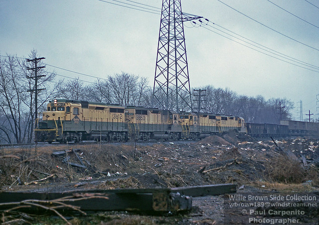 Reading GP30 #3612 {built 7/62 as RDG 5512} leads 3 GP35s through the beautiful New Jersey countryside at Bound Brook in April 1975.