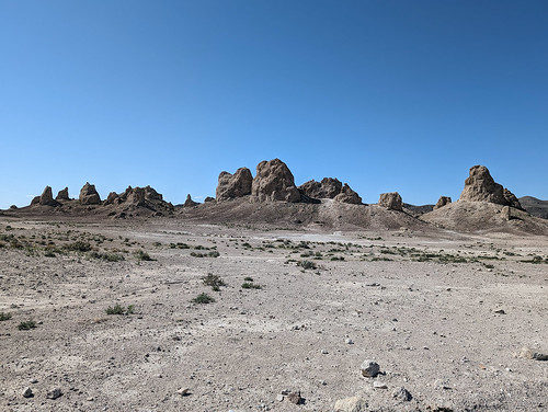 Wander to Trona Pinnacles A Death Valley trip to visit the ephemeral Lake Manly ended up cut short due to mechanical issues with the Jeep that prevented me from making it over the pass, but a few roadside vistas and a pitstop at Trona Pinnacles saved the day.

The Trona Pinnacles are a unique geological features in the California Desert Conservation Area. The unusual landscape consists of more than 500 tufa spires, some as high as 140 feet, rising from the bed of the Searles Dry Lake basin. The pinnacles vary in size and shape from short and squat to tall and thin, and are composed primarily of calcium carbonate (tufa). The Trona Pinnacles have been featured in many commercials, films, and still-photo shoots.

The Trona Pinnacles were designated a National Natural Landmark by the U.S. Department of the Interior in 1968 to preserve one of North America’s most outstanding examples of tufa tower formation.

Rising from the bottom of what was once an ancient lakebed, the Trona Pinnacles represent one of the most unique geologic landscapes in the California Desert. Over 500 of these tufa (or calcium carbonate spires) are spread out over a 14 square mile area across the Searles Lake basin. These features range in size from small-coral like boulders to several that top out at over 140 feet tall.

The Pinnacles were formed between 10,000 and 100,000 years ago when Searles Lake formed a link in a chain of interconnected lakes flowing from the Owens Valley to Death Valley. At one point during the Pleistocene, the area was under 640 feet of water.

Description from the Bureau of Land Management
&lt;a href=&quot;https://www.blm.gov/visit/trona-pinnacles&quot; rel=&quot;noreferrer nofollow&quot;&gt;www.blm.gov/visit/trona-pinnacles&lt;/a&gt;

