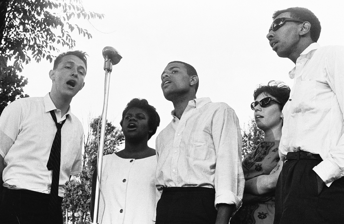 Bob Zellner, Bernice Reagon, Cordell Reagon, Dottie Miller (Zellner), and Avon Rollins singing in Danville, Virginia, June 1963