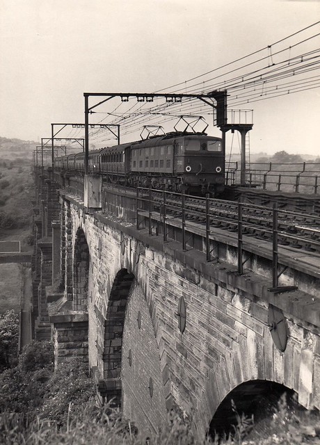 BR Class EM2 electric locomotive 27002 AURORA crossing Dinting Viaduct with a Manchester-Sheffield express.